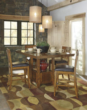 Load image into Gallery viewer, Ralene - Medium Brown - 5 Pc. - Rectangular Dining Room Counter Extension Table, 4 Upholstered Barstools