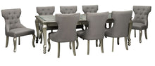 Load image into Gallery viewer, Coralayne - Silver Finish/Silver/White - 9 Pc. - Rectangular Dining Room Extension Table, 8 Upholstered Side Chairs