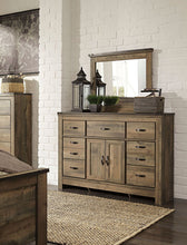 Load image into Gallery viewer, Trinell - Brown - 3 Pc. - Dresser with Fireplace Option, Mirror, Queen Panel Headboard