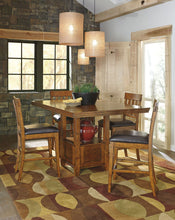 Load image into Gallery viewer, Ralene - Medium Brown - 5 Pc. - Rectangular Dining Room Counter Extension Table, 4 Upholstered Barstools